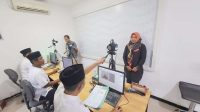 Hari Santri Nasional, Pelayanan SIM Satlantas Polres Jombang Kompak Pakai Baju Muslim Hari Santri Nasional, Pelayanan SIM Satlantas Polres Jombang Kompak Pakai Baju Muslim