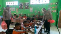 Polres Nganjuk Uji Coba Makan Siang Bergizi Gratis di SDN 1 Wilangan