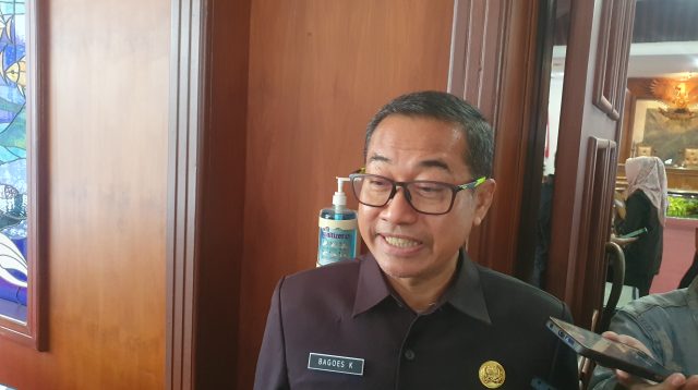 Kepala Bappeda Tulungagung memberikan pernyataan terkait capaian UHC di Tulungagung.