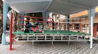 1000323664 Panitia mempersiapkan ring tempat atlet bertarung di SMAN 1 Ngimbang.